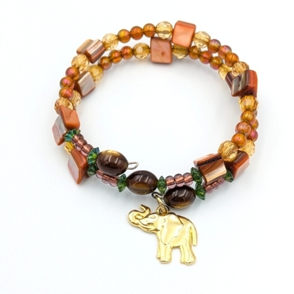 4/24$  Beaded wire bracelet with gold tone elephant charm